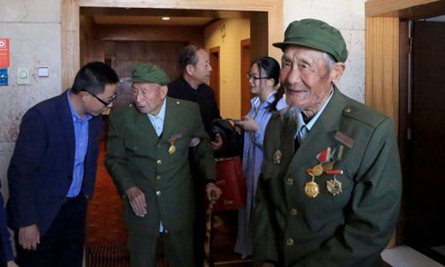 Veterans of the Long March, 96 year old Liu Hailin and 95 year old Kang Wenhua, carrying the torch of the Long March spirit into the future. Photo taken Yan'an City, Shaanxi Province, 19th October 2016. Photo: CRIENGLISH.com