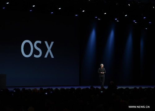 Apple CEO Tim Cook addresses the 2013 Apple WWDC at the Moscone Center in San Francisco, California, the United States, on June 10, 2013. (Xinhua) 