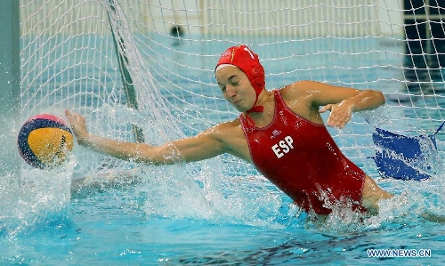 Goalkeeper L. Ester of Spain saves a shooting during the final for the 5th and 6th rank against Italy at the 2013 FINA Women's Water Polo World League Super Final in Beijing, capital of China, June 6, 2013. Spain won 10-8 to rank the 5th of the event. (Xinhua/Li Ming) 