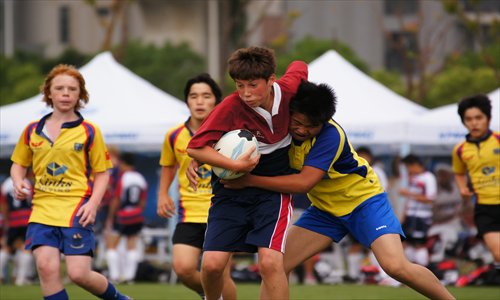 Junior players in action at the Shanghai Rugby Football Club. Photo: Cai Xianmin/GT