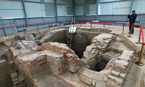 Tombs of Emperor Yang Guang, the second emperor of the Sui Dynasty (581-618), and his wife, Empress Xiao, have been found in Yangzhou, Jiangsu Province. Chinese archaeologists confirmed the discovery Saturday at a press conference. A large number of burial objects were unearthed from the ancient tombs discovered earlier this year, including two male teeth and a female's skeletal remains. Photo: CFP