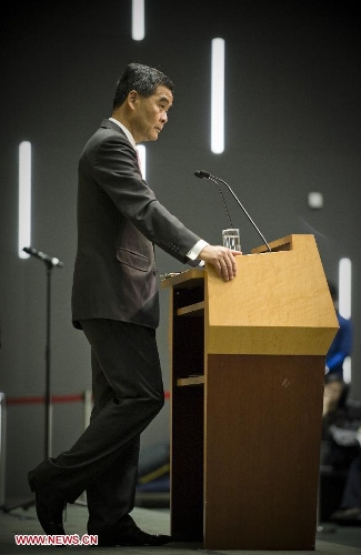  Hong Kong Chief Executive Leung Chun-Ying speaks to Journalist at a press conference after he delivered his 2013 Policy Address in Hong Kong, south China, Jan. 16, 2013. Leung delivered his first policy address on Wednesday morning at the Legislative Council here, outlining the city government's policy direction in 2013. (Xinhua/Lui Siu Wai)