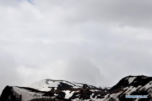 Snow is seen at the Changbai Mountain in northeast China's Jilin Province, May 19, 2013. (Xinhua/Zhang Jian)