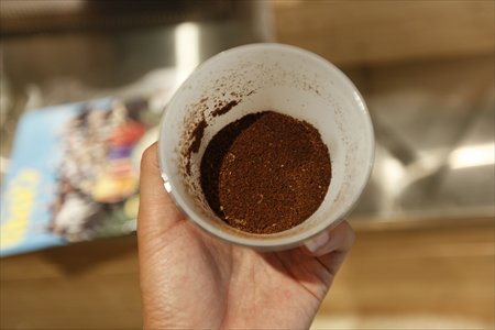 Coffee beans are carefully ground.