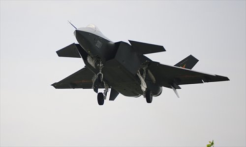 China conducted another test flight of its J-20 stealth flighter, number 2001, on Saturday. Photo: mil.huanqiu.com