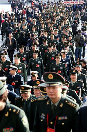 Delegates of the 18th National Congress of the Communist Party of China (CPC) arrive to attend the 18th CPC National Congress at the Great Hall of the People in Beijing, capital of China, November 8, 2012. The 18th CPC National Congress will be opened in Beijing on Thursday morning. Photo: Xinhua