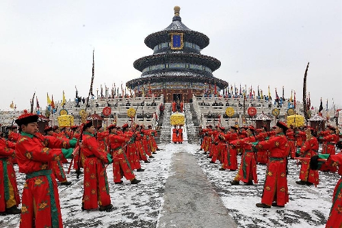 Performers dressed in costumes of the Qing Dynasty (1644-1911) act during a rehearsal of a performance presenting the ancient royal ritual to worship heaven at the Temple of Heaven in Beijing, capital of China, Feb. 5, 2013. The Temple of Heaven, used to be the imperial sacrificial altar in ancient China, will witness the heaven worship performance during the upcoming Spring Festival holiday. The Spring Festival, or the Chinese Lunar New Year, falls on Feb. 10 this year. (Xinhua/He Junchang)  