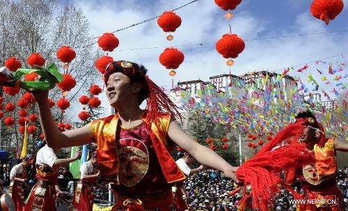 Folk artists give performance to mark the 54th anniversary of the abolishment of Tibet's feudal serfdom in Lhasa, capital of southwest China's Tibet Autonomous Region, March 28, 2013. Authorities have designated March 28 as the day to commemorate the 1959 democratic reform in Tibet, which ended the feudal serf system. The reform freed about 1 million Tibetans, over 90 percent of the region's population at the time, from a life of serfdom. (Xinhua/Chogo) 