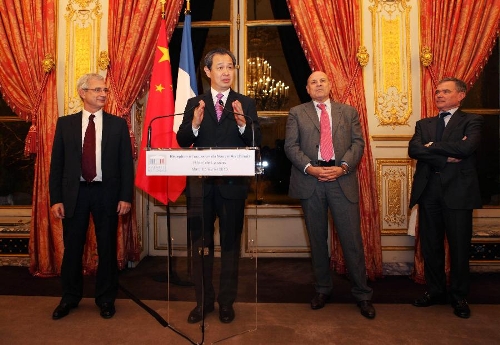 Chinese Ambassador to France Kong Quan (2nd L) addresses a Chinese lunar New Year reception at the residence of the speaker of France's National Assembly in Paris, capital of France, on Feb. 5, 2013. The Chinese Embassy to France and the France-China Friendship Group of France's National Assembly held the reception here on Tuesday to greet the upcoming Chinese lunar New Year, which falls on Feb. 10 this year. (Xinhua/Gao Jing) 