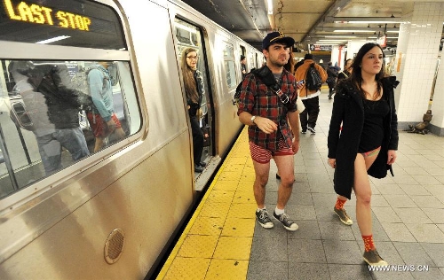  Participants take part in the No Pants Subway Ride in New York, the United States, on Jan. 13, 2013. (Xinhua/Wang Lei)