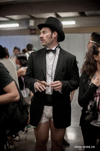 A man without pants takes part in the worldwide 