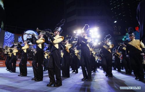 Performers participate in a celebration parade marking the opening of Shanghai Tourism Festival 2012, in East China's Shanghai, September 15, 2012. A total of 21 floats and 30 performing teams participated in the parade here on Saturday. Photo: Xinhua
