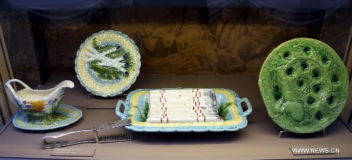 Photo taken on May 4, 2013 shows a set of classic French tableware displayed in an exhibition of 