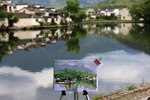 Hongcun village is located in Yixian county at the foot of the southwestern slope of Huangshan Mountain, Anhui Province. With morning mist, stone bridges, white walls, water lily ponds and hills, it has been described as a village out of a traditional Chinese ink painting. Besides halls, pavilions and temples, the village consists of 160 ancient residences. These architectures, with fantastic stone carvings, were built during the Ming and Qing dynasties and widely regarded as the best historic sites throughout China. Photo: China.org.cn