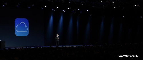 Apple CEO Tim Cook addresses the 2013 Apple WWDC at the Moscone Center in San Francisco, California, the United States, on June 10, 2013. (Xinhua) 