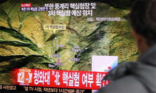 A man watches news reports of the suspected nuclear test by the Democratic People's Republic of Korea, in Seoul, South Korea, Feb. 12, 2013. The South Korean Defense Ministry believed that the Democratic People's Republic of Korea (DPRK) has conducted a nuclear test on Tuesday, a local TV station reported. The DPRK said on Tuesday that it has successfully conducted a third nuclear test to safeguard national security against US hostile policy, the official KCNA news agency reported. 