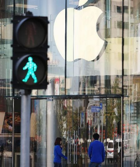 Photo taken on October 18, 2012 shows the exterior view of the new store of Apple Inc. on Wangfujing Street in Beijing, China's capital. The new store, which will reportedly be the largest Apple store in Asia, is expected to open on October 20. Photo: Xinhua