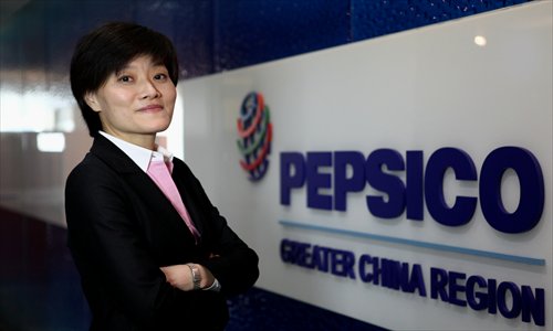 Katty Lam, chairman of PepsiCo Greater China Region Inset: PepsiCo's localized products Photos: Courtesy of PepsiCo, Cai Xianmin/GT