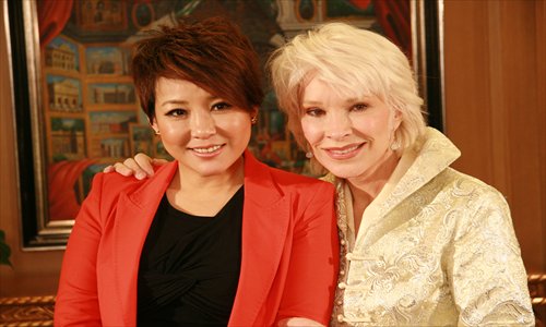 Nancy Merrill poses with Li Jing (left), a famous Chinese television anchor person herself as well as the founder of lafaso.com. Photos: Courtesy of Nancy Merrill