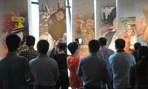 People visit the Wenchuan Earthquake Memorial Museum in the town of Qushan, Beichuan Qiang Autonomous County, southwest China's Sichuan Province, May 9, 2013. The museum was officially opened to the public for free on Thursday to commemorate the fifth anniversary of the Wenchuan earthquake, which hit Sichuan on May 12, 2008 and left more than 87,000 people dead or missing. (Xinhua/Xue Yubin) 