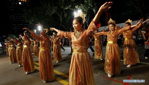 Performers participate in a celebration parade marking the opening of Shanghai Tourism Festival 2012, in East China's Shanghai, September 15, 2012. A total of 21 floats and 30 performing teams participated in the parade here on Saturday. Photo: Xinhua
