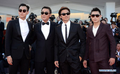 Chinese Hong Kong director Stephen Fung Tak-lun (2nd R), together with actors Tony Leung Ka-fai (2nd L), Eddie Peng (1st L) and Yuan Xiaochao pose on the red carpet of the Venice Film Festival in Venice, Italy, August 29, 2012. The 69th Venice International Film Festival opened here late Wednesday. Photo: Xinhua