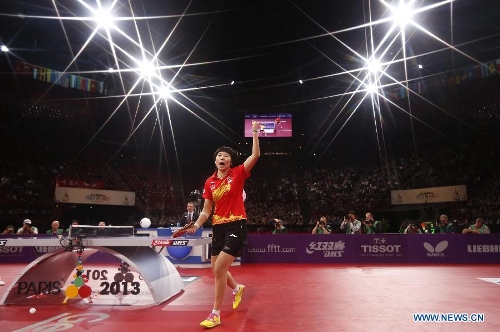  Li Xiaoxia of China celebrates after winning the final of women's singles against her teammate Liu Shiwen at the 2013 World Table Tennis Championships in Paris, France on May 19, 2013. Li won 4-2 to claim the title. (Xinhua/Wang Lili) 