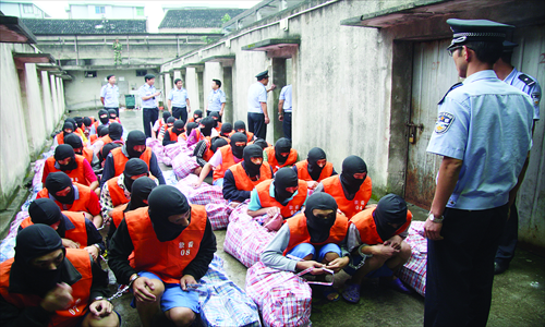 Over 600 detainees at a detention house in Xiangshan county, Zhejiang Province, are about to transfer to a new detention house in September, 2010 . Photo: IC