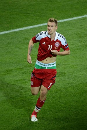 Nicklas Bendtner flashes the sponsored waistband of his underpants while celebrating his goal against Portugal on June 13. Photo: IC