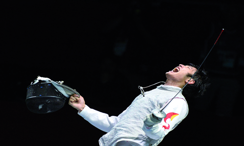 Lei Sheng celebrates his victory on Tuesday.