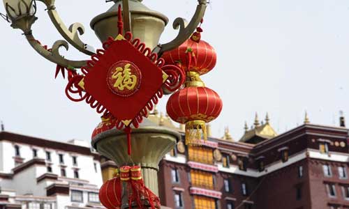 Decorations are seen on the street in Lhasa, capital of southwest China's Tibet Autonomous Region, Feb. 17, 2012. Local people of Tibetan ethnic group were to embrace the upcoming Tibetan New Year, which falls upon Feb. 22 this year. Photo:Xinhua