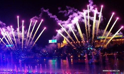 Fireworks are seen over the Liujiang River to celebrate the Chinese National Day holiday in Liuzhou, south China's Guangxi Zhuang Autonomous Region, October. 3, 2012. Photo: Xinhua