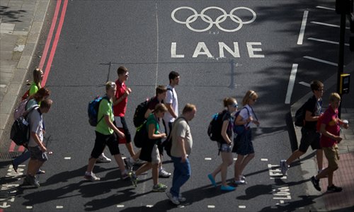 Olympic lanes are marked on a road in central London on Thursday, as it prepares to host the 2012 Olympic Games. Photo: AFP