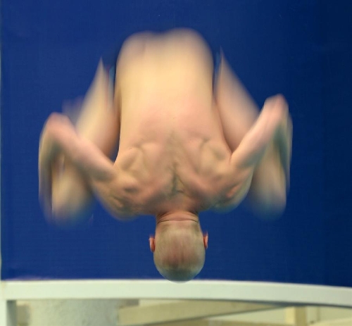 Ilya Zakharov of Russia competes during the men's 3m springboard semifinal B at the FINA Diving World Series 2013 held at the Aquatics Center, in Beijing, capital of China, on March 16, 2013. Ilya Zakharov enter the final with 496.70 points. (Xinhua/Guo Yong) 