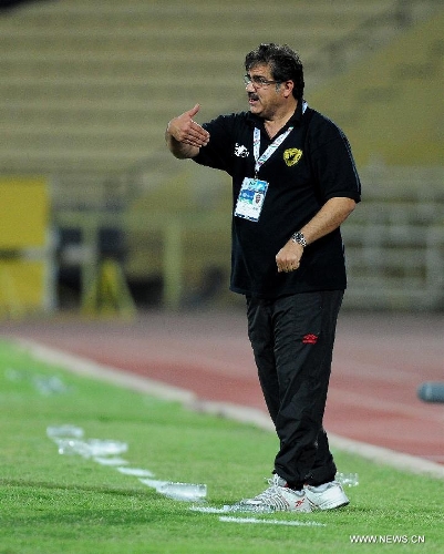 Kuwait's Qadsia SC Coach Muhammed Ibrahim reacts during the AFC Cup football match against Tajikistan's Ravshan SC in Kuwait City, Kuwait, on April 3, 2013. Qadsia won the match 3-0. (Xinhua/Noufal Ibrahim) 