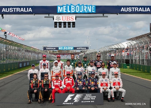  Formula One drivers pose for photograph before the Australian F1 Grand Prix at the Albert Park circuit in Melbourne, Australia, March 17, 2013. (Xinhua/Bai Xue)