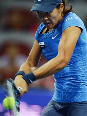 Li Na of China returns the ball during the women's singles 3rd round against Peng Shuai of China at the China Open tennis tournament in Beijing China, on October. 4, 2012.  Photo: Xinhua