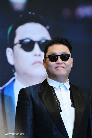 South Korean pop singer Psy attends a press conference before his performance in Singapore , December 1, 2012. (Xinhua/Then Chih Wey)


