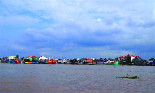 The Mekong river's colorful backdrop.
