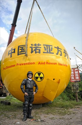 Yang Zongfu poses for a photo in front of the ark. Photo: Courtesy of Yang Zongfu