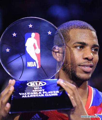 Chris Paul of the Los Angeles Clippers and the Western Conference celebrates after winning MVP in the 2013 NBA All-Star game at the Toyota Center on Feb. 17, 2013 in Houston, the United States, Feb. 17, 2013. (Xinhua/Zhang Jun) 