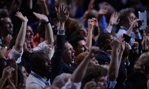 Supporters of U.S. President Barack Obama gather at an Election Night rally in Chicago, Illinois on November 6, 2012. Obama has won re-election in the U.S. presidential race, TV networks projected on Tuesday. Photo: Xinhua