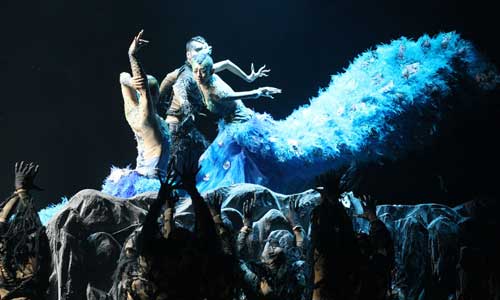 Dancer master Yang Liping (R) performs the dance drama 