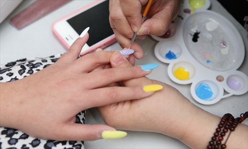 A simple trip to the nail salon can lead to a common scam. Photo: CFP 