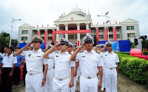 Navy officers attend a ceremony to mark the establishment of Sansha city on the Yongxing Island in China's southernmost province of Hainan, July 24, 2012. The State Council, or China's cabinet, in June approved the establishment of Sansha, a prefectural-level city in Hainan to administer the Xisha, Zhongsha and Nansha islands and the surrounding waters in the South China Sea. The Yongxing Island is part of the Xisha Islands. Photo: Xinhua