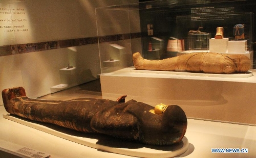 Photo taken on April 27, 2013 shows two human mummies at Singapore's Marina Bay Sands ArtScience Museum in Singapore. An exhibition named 