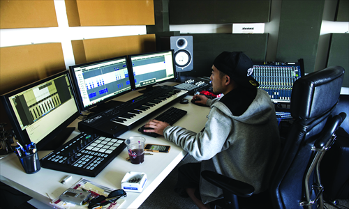 CRI host Wes Chen prepares a playlist for his Chinese hip-hop radio show The Park. Photo: Li Hao/GT