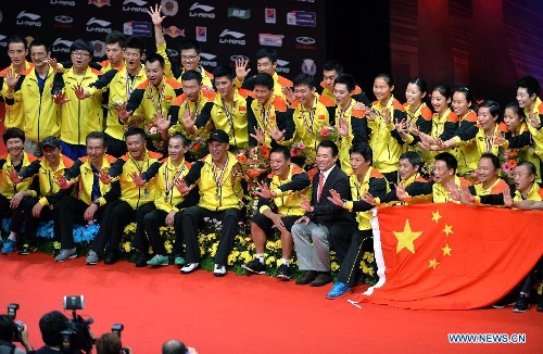 Players of China celebrate during the awarding ceremony after the final match against South Korea at the Sudirman Cup World Team Badminton Championships in Kuala Lumpur, Malaysia, on May 26, 2013. Team China won the champion with 3-0. (Xinhua/Chen Xiaowei)  