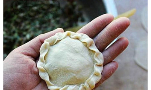 Jiaozi is made in sunflower shape. (Source: www.nen.com.cn)