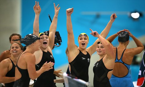 Libby Trickett (left), Emily Seebohm, Brittany Elmslie and Yolane Kukla of Australia celebrates their victory in the Women's 4x100m Freestyle Relay of the London Olympic Games. Photo: CFP 
